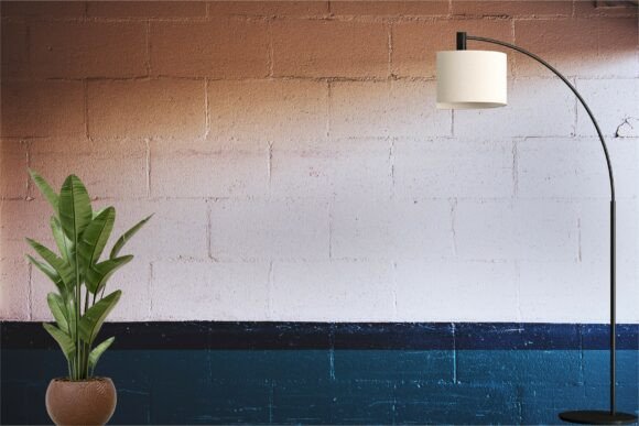 Transform Your Visual Projects with the Empty Brick Room with Standing Lamp Background